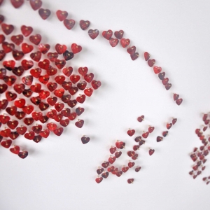 MOM DETAIL – 2013 Red shell hearts and stainless steel nails on white lacquered board - 60” x 60” - N/A